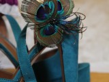 teal wedding shoes with hgih heels and peacock feathers for an accent