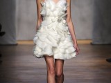 a short strapless ruffle wedding dress and a romantic headpiece for a bold modern and romantic look