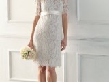 a short lace sheath wedding dress with an illusion neckline and short sleeves is a traditional and romantic option