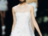 an embellished short A-line sleeveless wedding dress with an illusion neckline and a ruffle skirt for a quirky and bold look