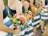 bold strapless bridesmaid dresses with black bodices and blue and white knee dresses are very cool, fresh and bright