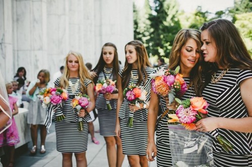 striped peplum black and white knee bridesmaid dresses with a high neckline and cap sleeves, bold wedding bouquets for a bold and chic look