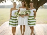 one shoulder knee bridesmaid dresses with white bodices and striped A-line skirts are great for spring or summer weddings