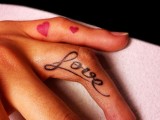 If you are a romantic person, tattoo LOVE on the side of your finger to make it visible when you want