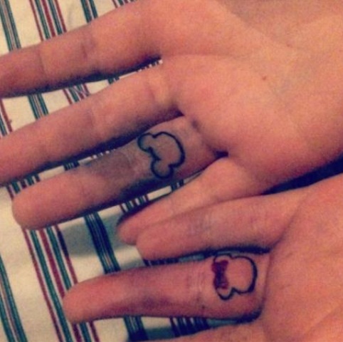 Mickey and Minnie Mouse secret tattoos for a Disney obsessed couple