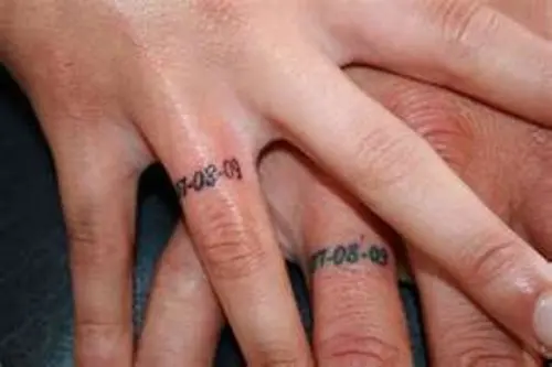 Wedding date ring tattoos done with usual numbers