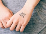 LOVE tattoo on the hand is always a good idea, wherever you make it, and you can make it even if you aren’t getting married
