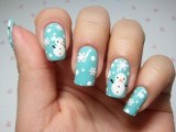 tiffany blue nails with polka dots, snowflakes and snowmen are lovely and bold for a bride who loves all things whimsy