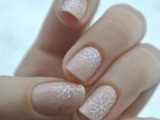 blush nails with snowflakes with some rhinestones are a romantic and chic idea for a winter bride