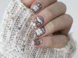 white, grey, tan and brown nails with various Scandinavian patterns showing off snowflakes are amazing for a cozy touch