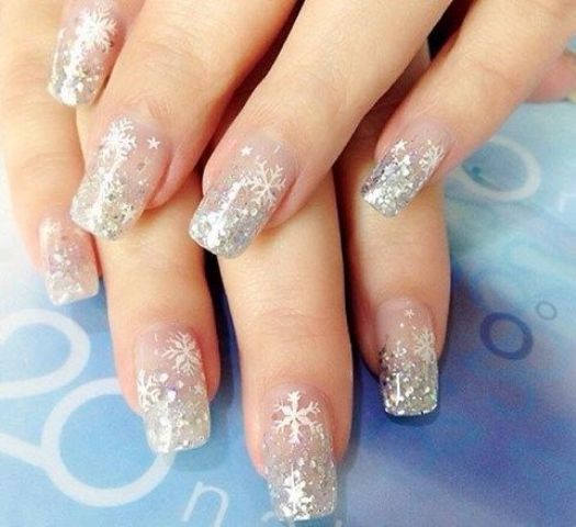 a silver glitter wedding manicure with snowflakes, stars and polka dots will help you shine all over