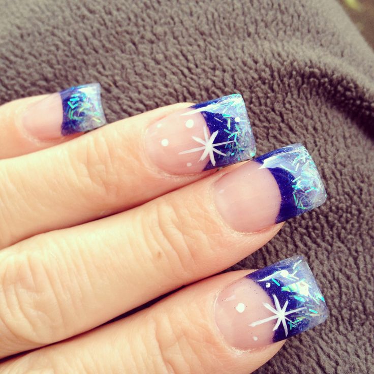 French winter nails with blue tips, snowflakes and glitter plus stars are lovely for a winter bride