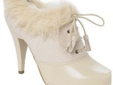 neutral faux fur booties with laces with tassels are chic and cool and won’t let you feel cold
