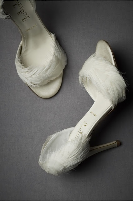 white feather shoes are a glam and chic idea for a winter bride, they will bring a touch of comfort and softness