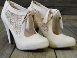 neutral cutout booties with lace inserts and ties are great for vintage-inspired winter brides