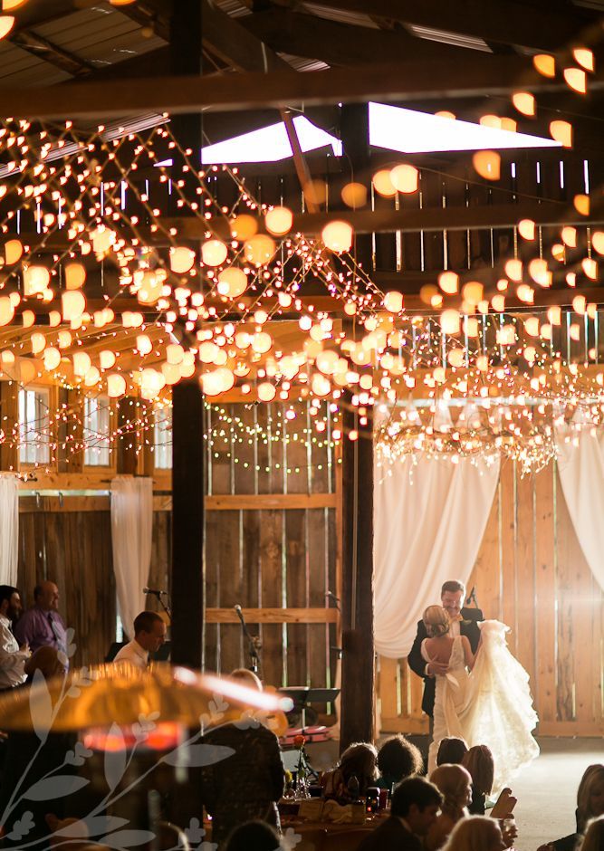 whole canopies of string lights over the space, curtains formed of them are amazing to light up the space and make it cooler