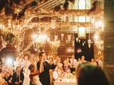 a super lit up venue with lights, chandeliers, glass pendant lamps is very welcoming, bright and super cool and invites you in