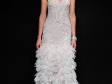 a chic 20s inspired wedding dress with a fully beaded bodice and a ruffle skirt, with no sleeves and a V-neckline