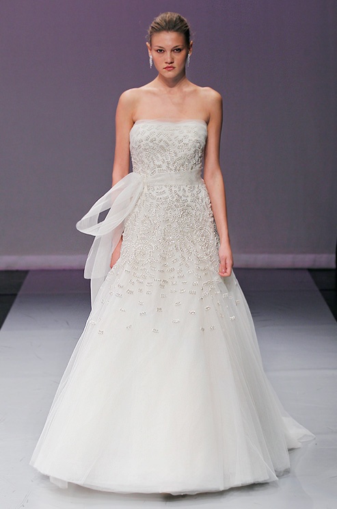 a strapless beaded wedding ballgown with a train and a sash is a refined and chic idea for a formal and exquisite wedding