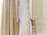 a sleeveless high neckline mermaid wedding dress with floral beading and a small train is a very refined and chic idea for a modern romantic bride