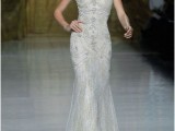 a plain mermaid underdress paired with a refined and chic sheer beaded overdress with a train is a gorgeous solution for a refined and chic bride