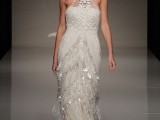 a boho lace embellished fitting wedding dress with a halter neckline and matching headpiece