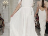 a flowy and airy halter neckline wedding dress with draperies and a silver sash with tassels for a minimalist bride