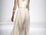 a modern midi wedding dress with a draped bodice and an airy skirt, red ankle strap shoes