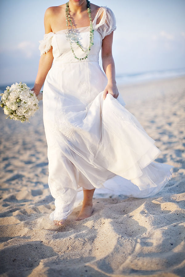 A romantic plain off the shoulder wedding dress with layered necklaces is a chic and beautiful idea
