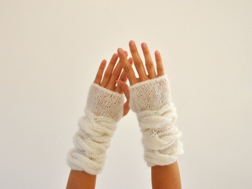 white crochet fingerless gloves with 3D patterns are great to wear them in winter and they will spruce up even the simplest bridal look