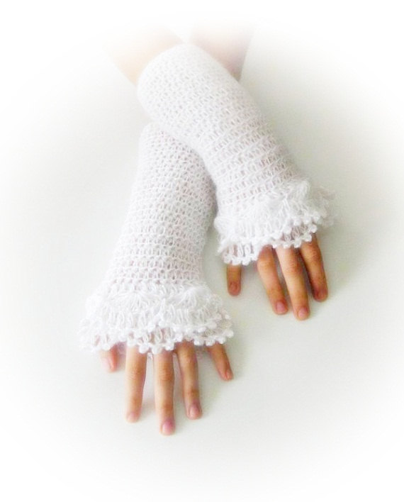 Long white crochet fingerless gloves are warm and cozy and will make your look cute, you will feel comfortable outside
