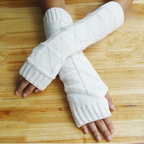 classy long white knit gloves with no fingers remind of sweaters and cozy up any winter bridal look making it more relaxed and comfy