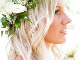 a spring flower bridal crown of white roses, white, lilac and purple blooms and greenery is a chic idea for a spring bride