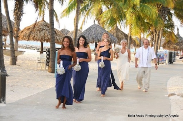 Mismatching navy maxi bridesmaid dresses are an elegant and refined touch to your wedding