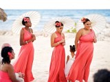mismatching coral maxi bridesmaid dresses for a bright beach wedding