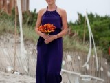deep purple maxi bridesmaid dress with a halter neckline for a bold beach wedding