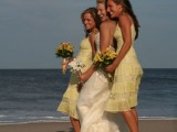 simple yellow knee A-line dresses on straps are comfortable and will add color to the wedding color scheme