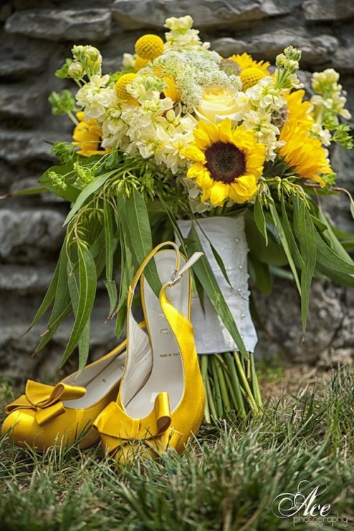 a bright wedding bouquet of sunflowers, billy balls and white hydrangeas, greenery and a neutral wrap is amazing for a rustic summer wedding