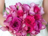a colorful wedding bouquet of hot pink and light pink blooms is a cool and bold idea for spring or summer weddings with color