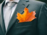 bold fall pocketsquare with a single orange leaf is a catchy and very modern idea for a fall groom