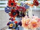 colorful floral fall wedding centerpieces of bright blooms, dark foliage and flowers are easy to DIY for your fall wedding