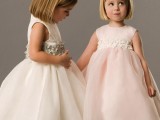 sleeveless white and blush A-line dresses with embellished sashes are nice for a formal wedding