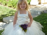 a neutral flower girl dress with a silky bodice, straps and a tulle skirt is a lovely idea with a cute touch