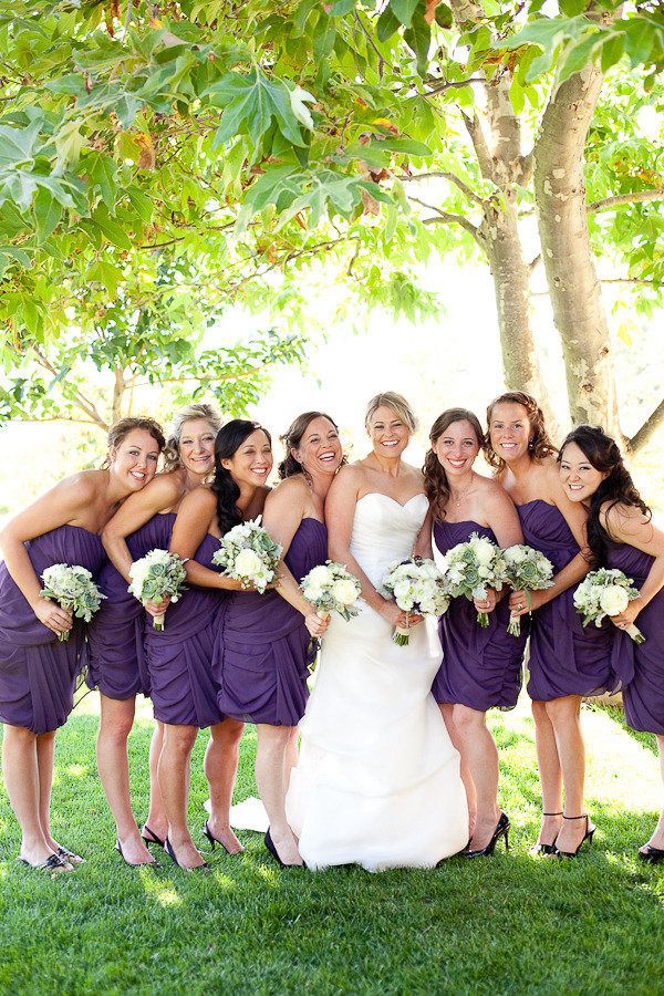 Purple strapless draped short bridesmaid dresses can be a nice choice for a Halloween wedding