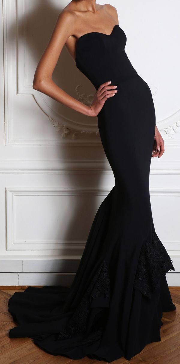 a sexy strapless mermaid maxi dress with a train and lace touches on the skirt is fantastic and statement like