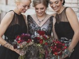 elegant midi black A-line bridesmaid dresses with illusion necklines and draped fabric look chic and stylish at a Halloween wedding