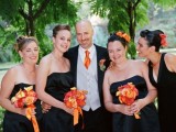 mismatching strapless and strap black bridesmaid dresses and orange bouquets for a Halloween wedding