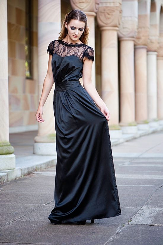 a black maxi bridesmaid dress with a draped and lace bodice and black shoes for a timeless Halloween bridesmaid look