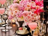 a beautiful and refined Valentine’s Day wedding table with printed plates, blush and hot pink blooms, gold touches and printed goblets