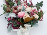 a bold winter wedding bouquet with white and pink blooms, textural greenery and much dimension